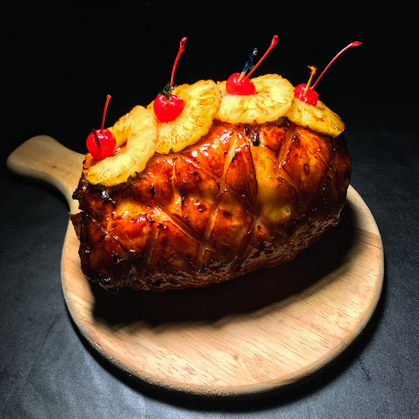 Boneless smoked Gammon Ham with pineapple and rum sauce